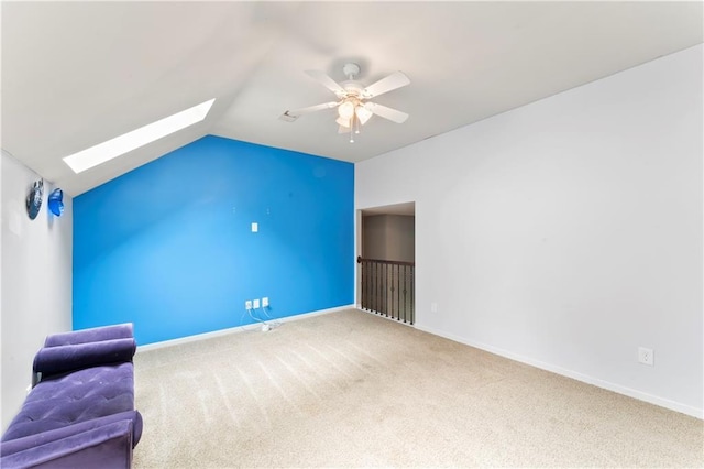 4504 NE 60th Ter, Kansas City, MO 64119 - bonus room with ceiling fan, carpet, baseboards, and lofted ceiling with skylight