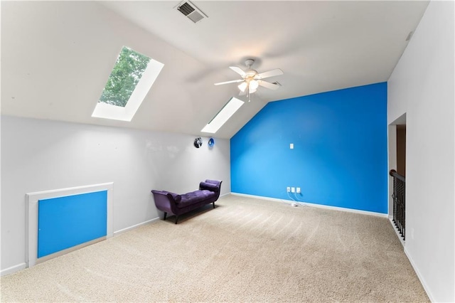4504 NE 60th Ter, Kansas City, MO 64119 - bonus room with a ceiling fan, visible vents, lofted ceiling with skylight, and carpet