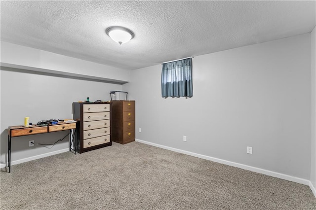 4504 NE 60th Ter, Kansas City, MO 64119 - carpeted bedroom featuring baseboards and a textured ceiling
