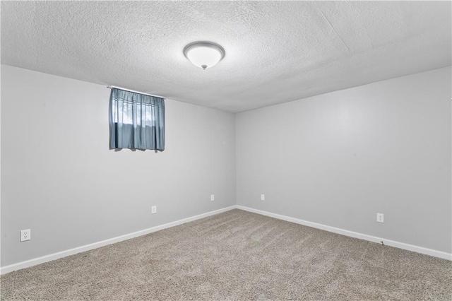 4504 NE 60th Ter, Kansas City, MO 64119 - carpeted spare room featuring baseboards and a textured ceiling