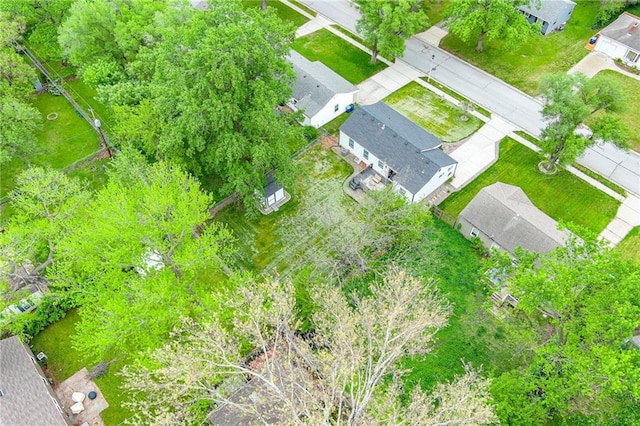 birds eye view of property with a residential view