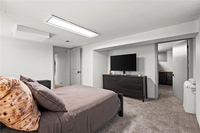 bedroom with light carpet and visible vents