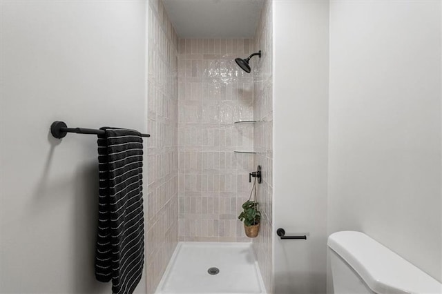 1504 SW Morningside Dr, Blue Springs, MO 64018 - bathroom featuring tiled shower and toilet