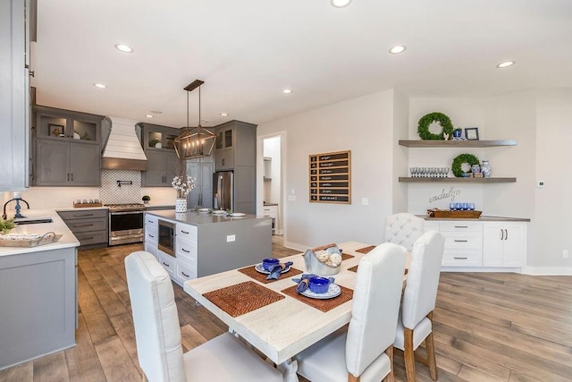 25054 W 141st St, Olathe, KS 66061 - dining space featuring recessed lighting and light wood finished floors