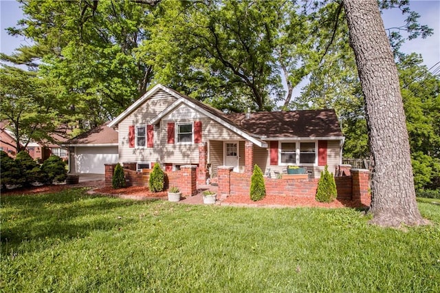 2806 S Whitney Ave, Independence, MO 64057 - tri-level home featuring a front lawn and a garage