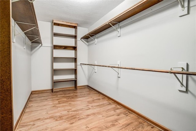 4008 NW 75th St, Kansas City, MO 64151 - walk in closet featuring light wood finished floors