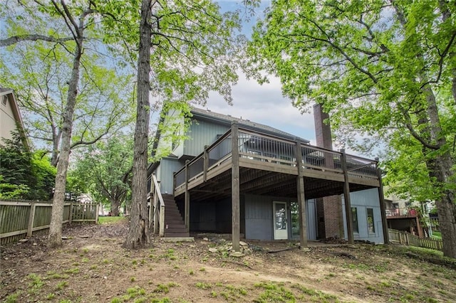 4008 NW 75th St, Kansas City, MO 64151 - back of house featuring a wooden deck, fence, and stairway