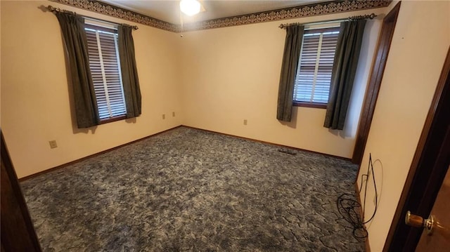 2704 S Taylor St, Pittsburg, KS 66762 - empty room with carpet floors and baseboards