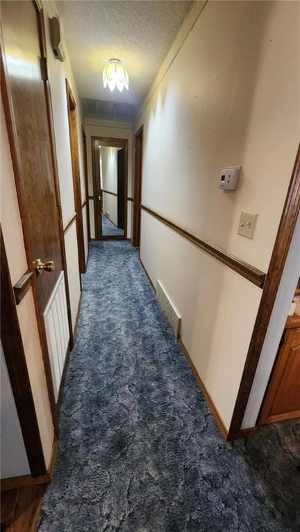 2704 S Taylor St, Pittsburg, KS 66762 - corridor featuring carpet flooring and a textured ceiling