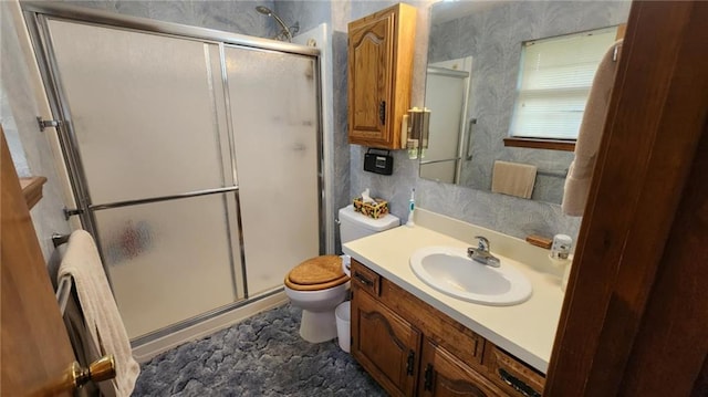 2704 S Taylor St, Pittsburg, KS 66762 - full bath featuring a stall shower, vanity, and wallpapered walls