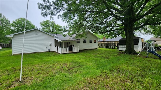 2704 S Taylor St, Pittsburg, KS 66762 - back of property featuring a storage unit