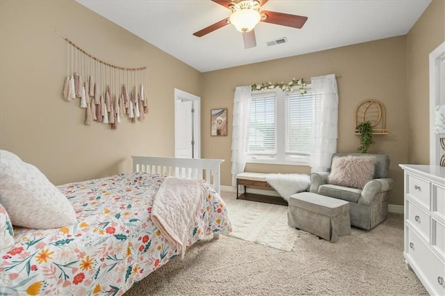 2704 SW Gray Ln, Lees Summit, MO 64081 - bedroom with light carpet, baseboards, and a ceiling fan