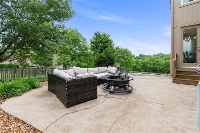 2704 SW Gray Ln, Lees Summit, MO 64081 - view of patio with an outdoor living space with a fire pit