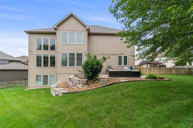 2704 SW Gray Ln, Lees Summit, MO 64081 - back of property with a patio