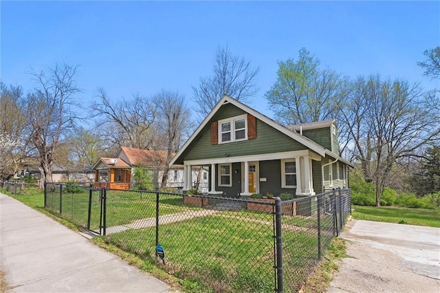 4331 Virginia Ave, Kansas City, MO 64110 - bungalow-style house with covered porch