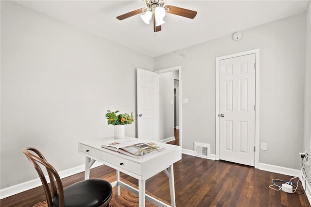4331 Virginia Ave, Kansas City, MO 64110 - home office featuring a ceiling fan, baseboards, and wood finished floors