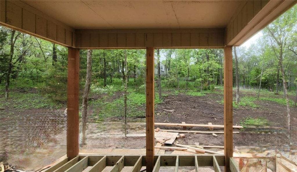 exterior space with a forest view