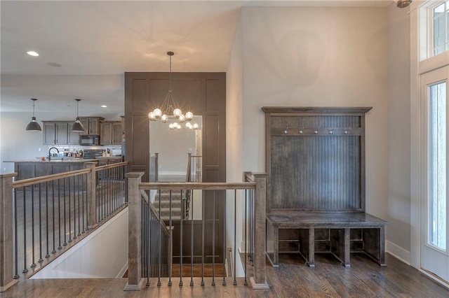 3525 S Woodland Ct, Independence, MO 64052 - interior space featuring recessed lighting, baseboards, an inviting chandelier, and wood finished floors