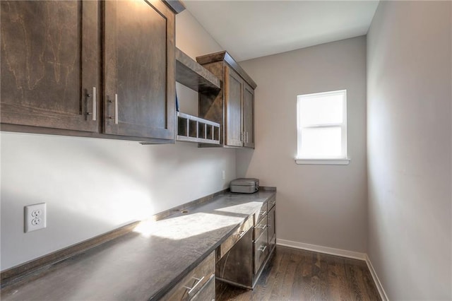 3525 S Woodland Ct, Independence, MO 64052 - unfurnished office with baseboards and dark wood finished floors