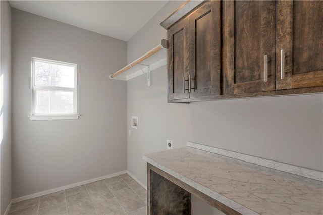 3525 S Woodland Ct, Independence, MO 64052 - laundry area featuring cabinet space, hookup for an electric dryer, baseboards, and hookup for a washing machine