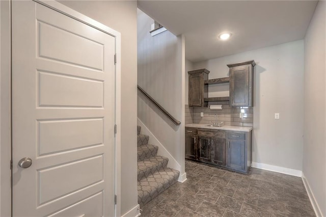 3525 S Woodland Ct, Independence, MO 64052 - stairway with baseboards