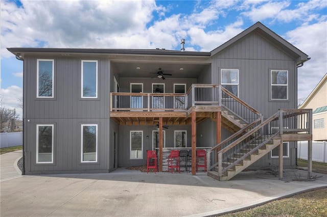 3525 S Woodland Ct, Independence, MO 64052 - rear view of house featuring stairs, ceiling fan, a deck, and a patio