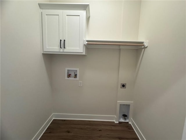 15610 Sheridan Ct, Basehor, KS 66007 - laundry area with hookup for an electric dryer, washer hookup, dark wood-style flooring, baseboards, and cabinet space