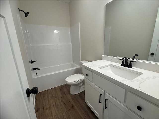 15610 Sheridan Ct, Basehor, KS 66007 - full bathroom featuring wood finished floors, vanity, toilet, and shower / tub combination