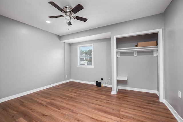 1001 Kickapoo St, Leavenworth, KS 66048 - unfurnished bedroom with wood finished floors, recessed lighting, baseboards, a closet, and a ceiling fan