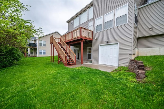 2500 Gabrianna Ct, Columbia, MO 65203 - back of house featuring a lawn, a wooden deck, and stairway