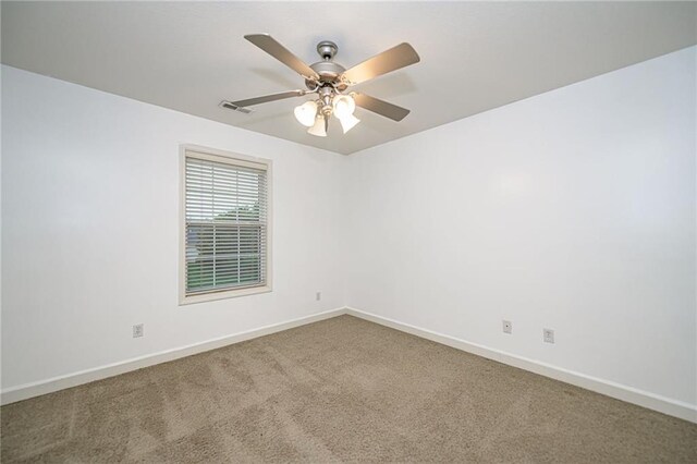 2500 Gabrianna Ct, Columbia, MO 65203 - carpeted spare room featuring baseboards, a ceiling fan, and visible vents