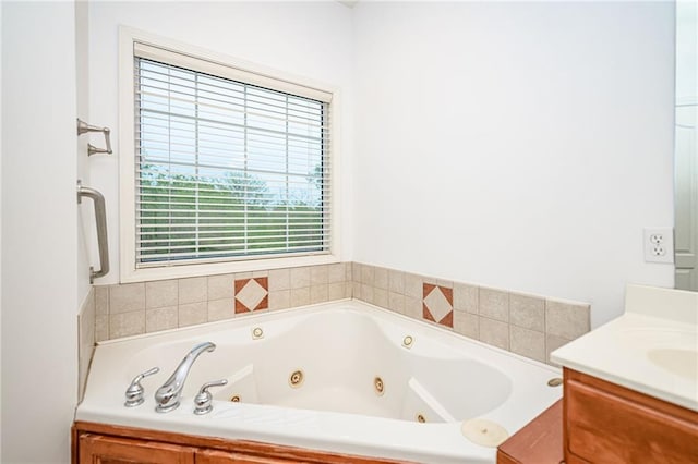2500 Gabrianna Ct, Columbia, MO 65203 - bathroom featuring a tub with jets and vanity
