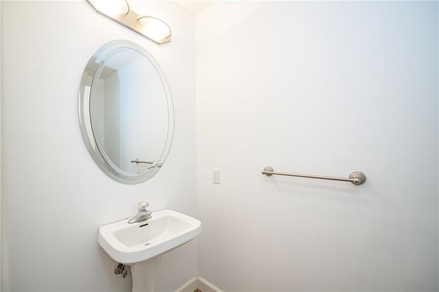 2500 Gabrianna Ct, Columbia, MO 65203 - bathroom featuring baseboards and a sink