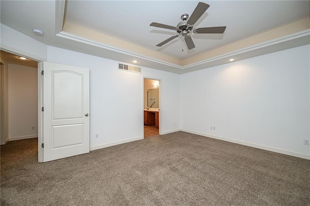 2500 Gabrianna Ct, Columbia, MO 65203 - unfurnished bedroom featuring carpet, a tray ceiling, recessed lighting, and visible vents