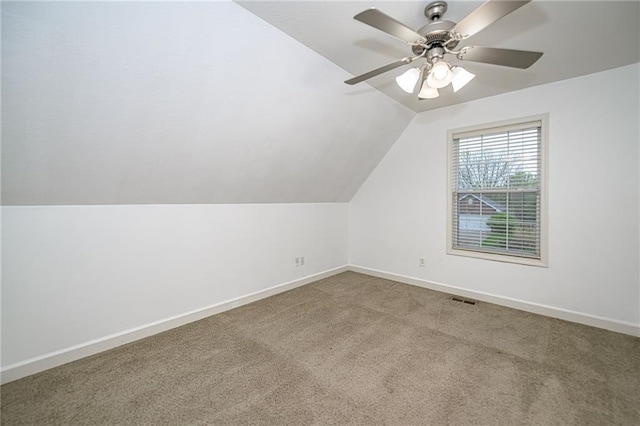 2500 Gabrianna Ct, Columbia, MO 65203 - additional living space with ceiling fan, carpet, baseboards, vaulted ceiling, and visible vents