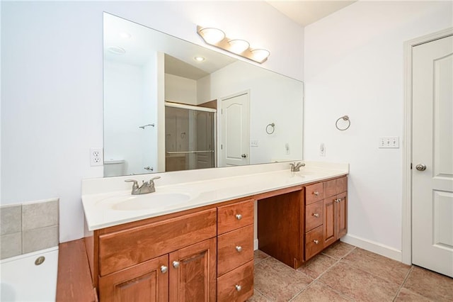 2500 Gabrianna Ct, Columbia, MO 65203 - bathroom featuring double vanity, a sink, tile patterned flooring, and a stall shower