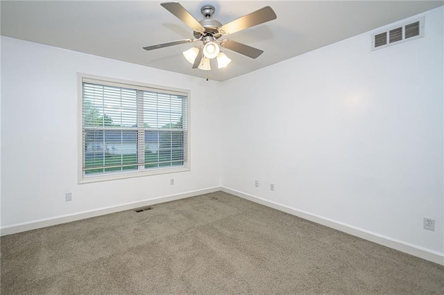 2500 Gabrianna Ct, Columbia, MO 65203 - empty room with visible vents, baseboards, ceiling fan, and carpet floors