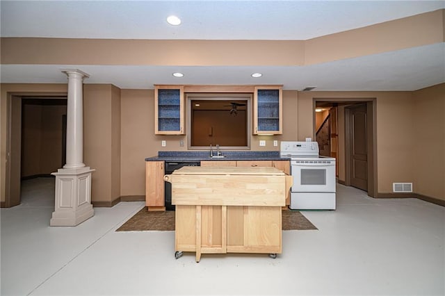 2500 Gabrianna Ct, Columbia, MO 65203 - kitchen featuring finished concrete floors, dishwasher, a sink, baseboards, and electric stove