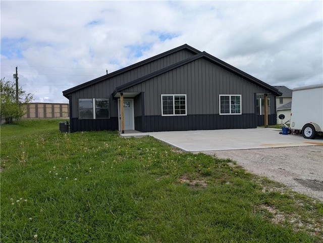 597 SE 110th St, Warrensburg, MO 64093 - modern inspired farmhouse featuring board and batten siding, central AC, and a front yard