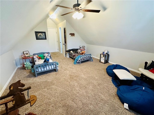 carpeted bedroom featuring baseboards, ceiling fan, and lofted ceiling