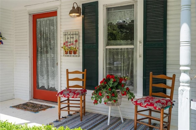 doorway to property featuring a porch