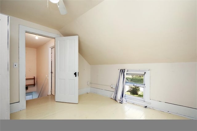 additional living space with lofted ceiling and ceiling fan