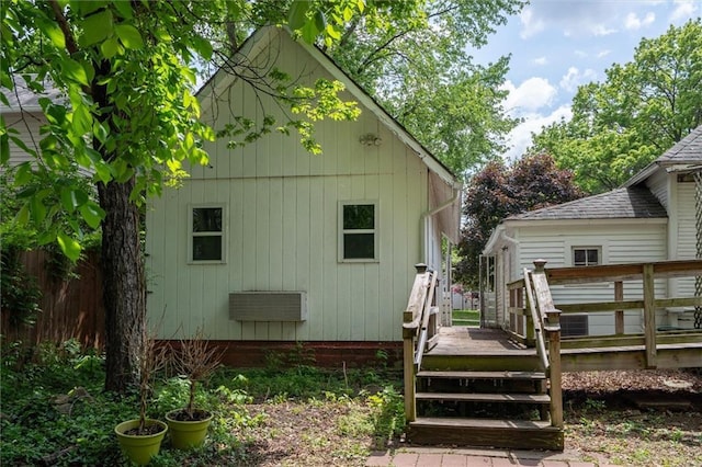rear view of house with a deck
