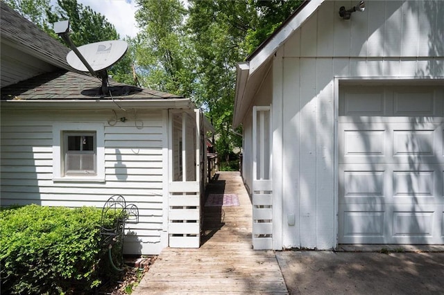 view of side of property featuring a garage