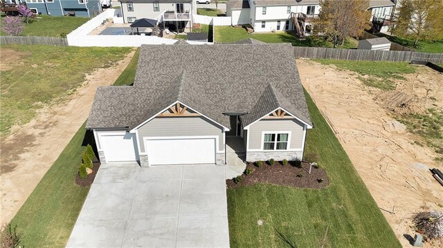 birds eye view of property with a residential view