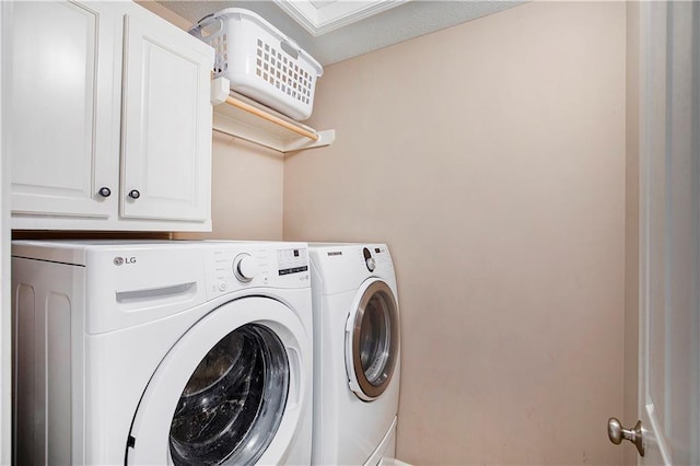 laundry area featuring independent washer and dryer