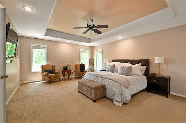 7419 Constance St, Shawnee, KS 66216 - bedroom with a raised ceiling, light carpet, baseboards, recessed lighting, and ceiling fan