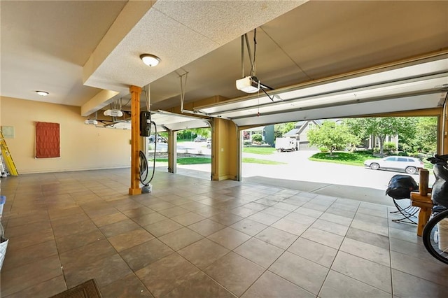 7419 Constance St, Shawnee, KS 66216 - garage featuring a garage door opener
