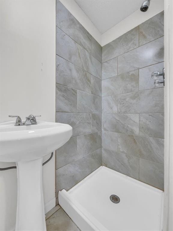 full bathroom with a shower stall