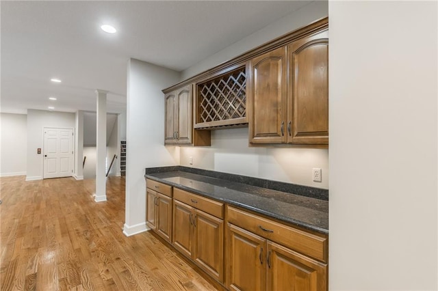 875 Clearview Dr, Lansing, KS 66043 - indoor dry bar with light wood finished floors, recessed lighting, and ornate columns